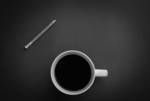pencil and cup of coffee